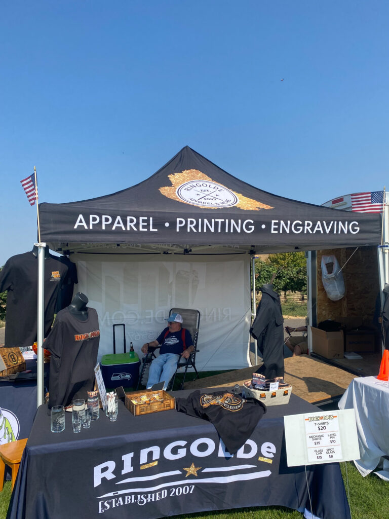 Outdoor apparel and printing vendor booth display
