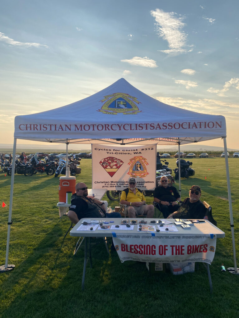 Christian Motorcyclists Association tent at bike blessing event