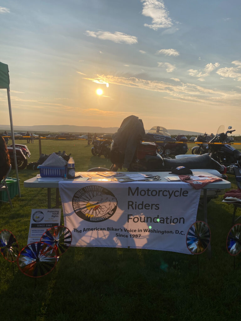 Motorcycle Riders Foundation booth at sunset event